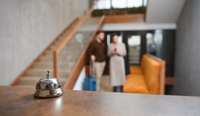 couple-on-a-business-trip-doing-check-in-at-the-ho-2024-04-23-02-22-44-utc-min