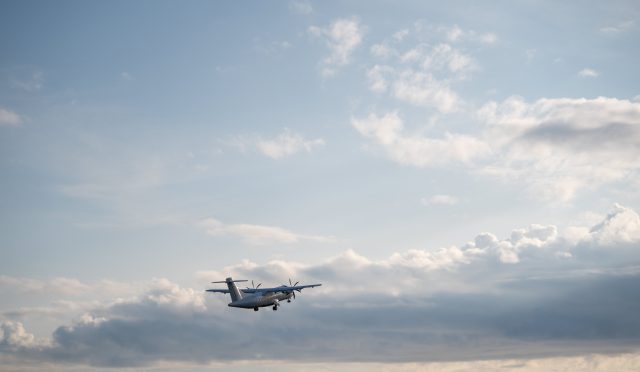 passenger-plane-in-sky-with-clouds-2023-11-27-05-19-15-utc-min